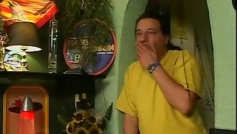 A Blonde Woman Is Taken From Behind And Penetrated By Two Men In A Bar